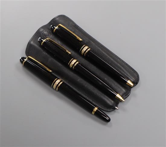 A cased set of three small Mont Blanc pens, in leather case - comprising two ball points and a fountain pen